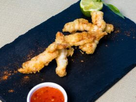 fried chicken on black rectangular plate