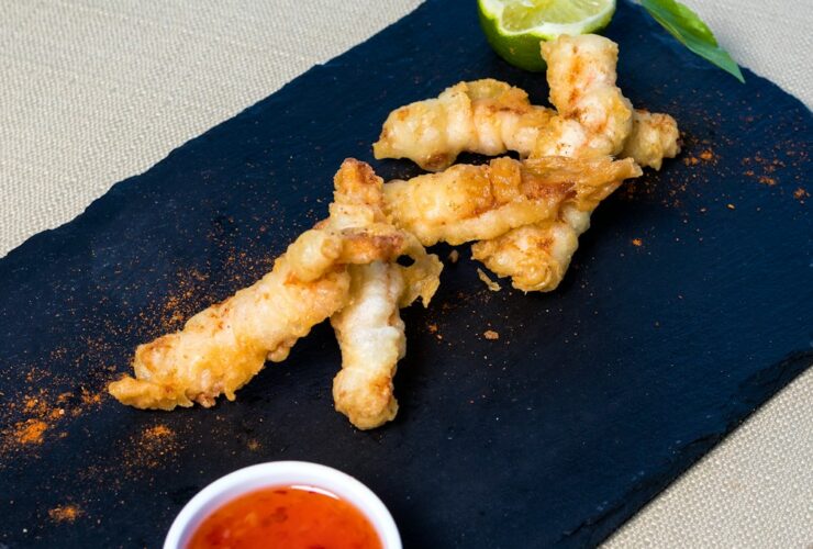 fried chicken on black rectangular plate